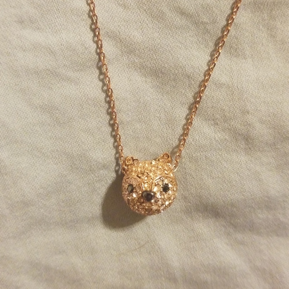 Fossil jeweled animal necklace